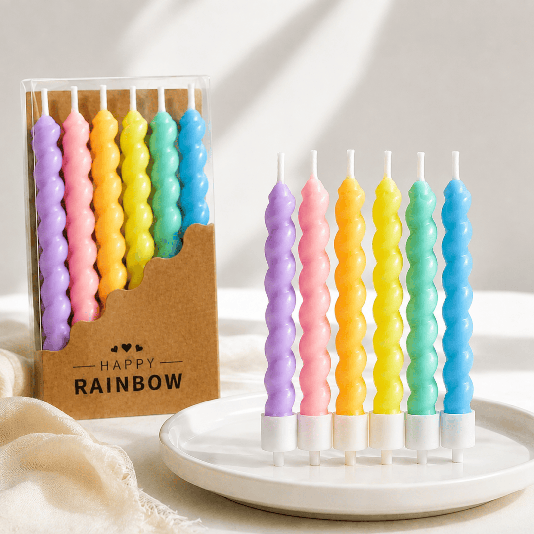 Pastel rainbow spiral birthday candle in purple , pink, yellow , mint and blue for sweet Börek celebration cakes.